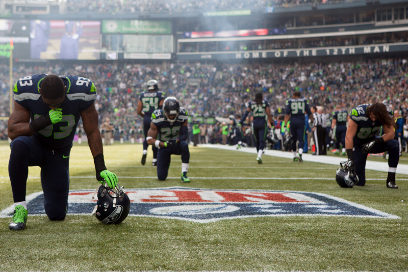 Players collect their thoughts before the game.