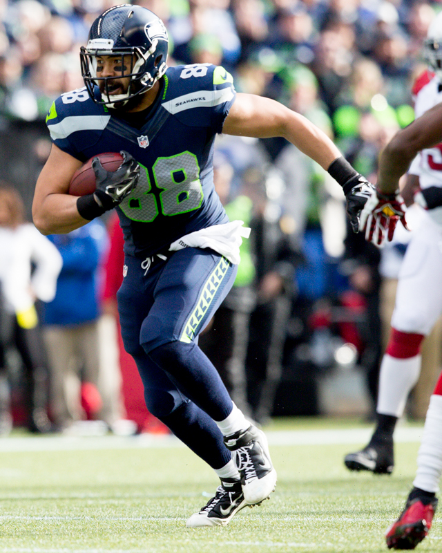 Newly-signed Seattle tight end Tony Moeaki moves upfield for a 17-yard gain in the first quarter.