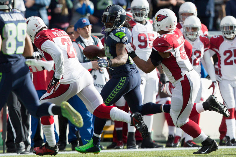 Seattle runningback Marshawn Lynch is run out of bounds on a 9-yard gain in the first quarter.