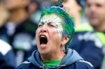 A Seattle fan protests a call by refereres in the second quarter.