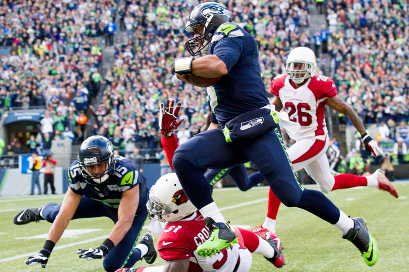 Seattle quarterback Russell Wilson runs for a gain of 40 yards in the second quarter.