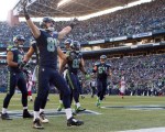 Seahawks tight-end Cooper Helfet celebrates his 20-yard touchdown in the third quarter.