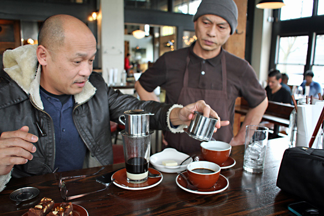 Banh making a proper Vietnamese coffee.