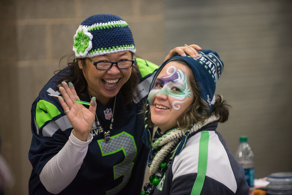 A visit to Touchdown City before the game offered up free face painting.