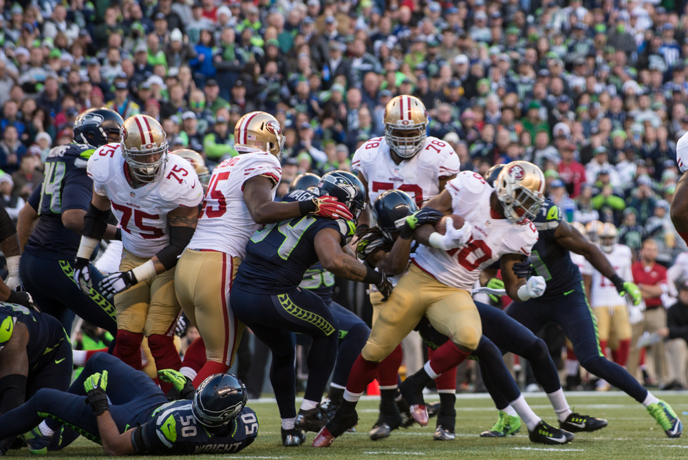 Hyde making a run for it in the third only to be taken down by Earl Thomas and Richard Sherman.