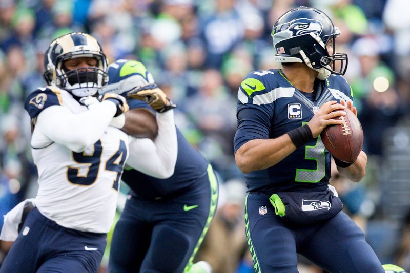Seahawks' quarterback Russell Wilson searches for an open receiver in the first quarter.