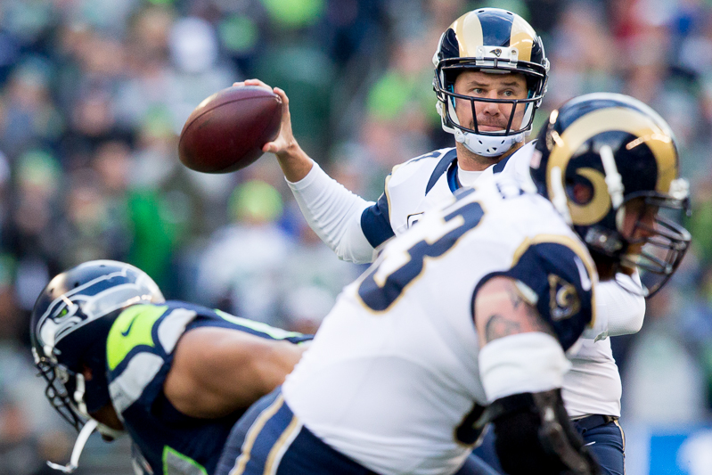 Rams quarterback Shaun Hill throws a pass in the first quarter.