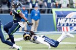 Seahawks' running back Robert Turbin evades a Rams defender on a run in the first quarter.