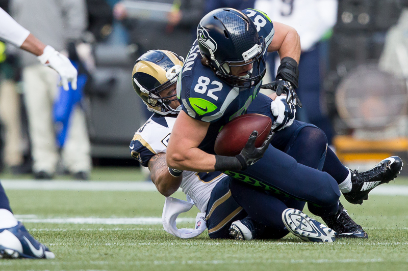 Seattle tight end Luke Wilson is brought down for a 4-yard gain in the first quarter.
