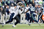 Hawks' receiver Paul Richardson gets his bearings after an overthrown pass intended for him was intercepted by Rams' cornerback Marcus Roberson.