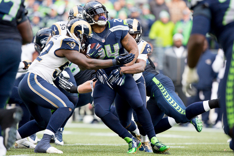 Marshawn Lynch rumbles upfield for a gain in the second quarter.