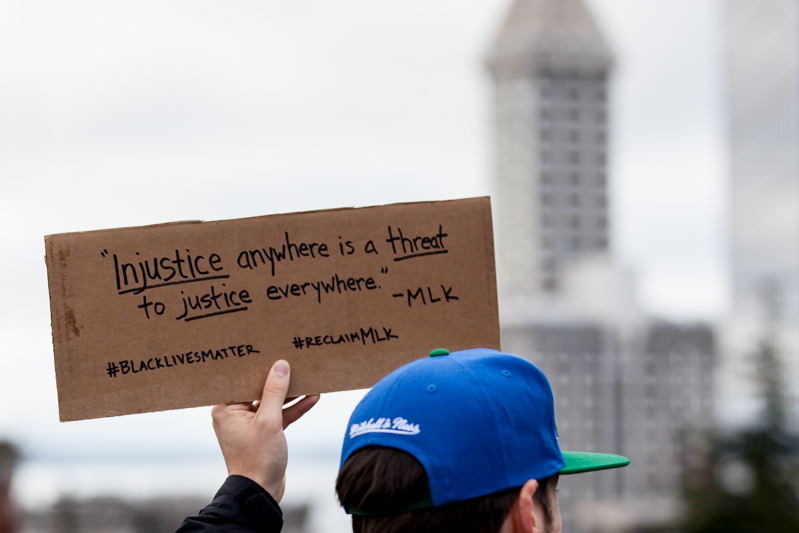  Photo by Jeremy Dwyer-Lindgren Thousands gathered peacefully in Seattle streets Monday both