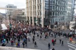 Thousands pause in front of the Seattle Police headquarters in downtown.