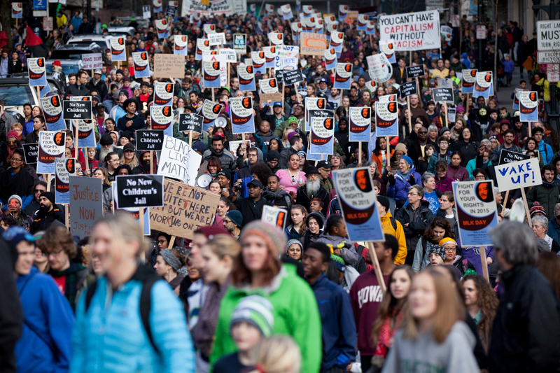  Photo by Jeremy Dwyer-Lindgren Thousands gathered peacefully in Seattle streets Monday both