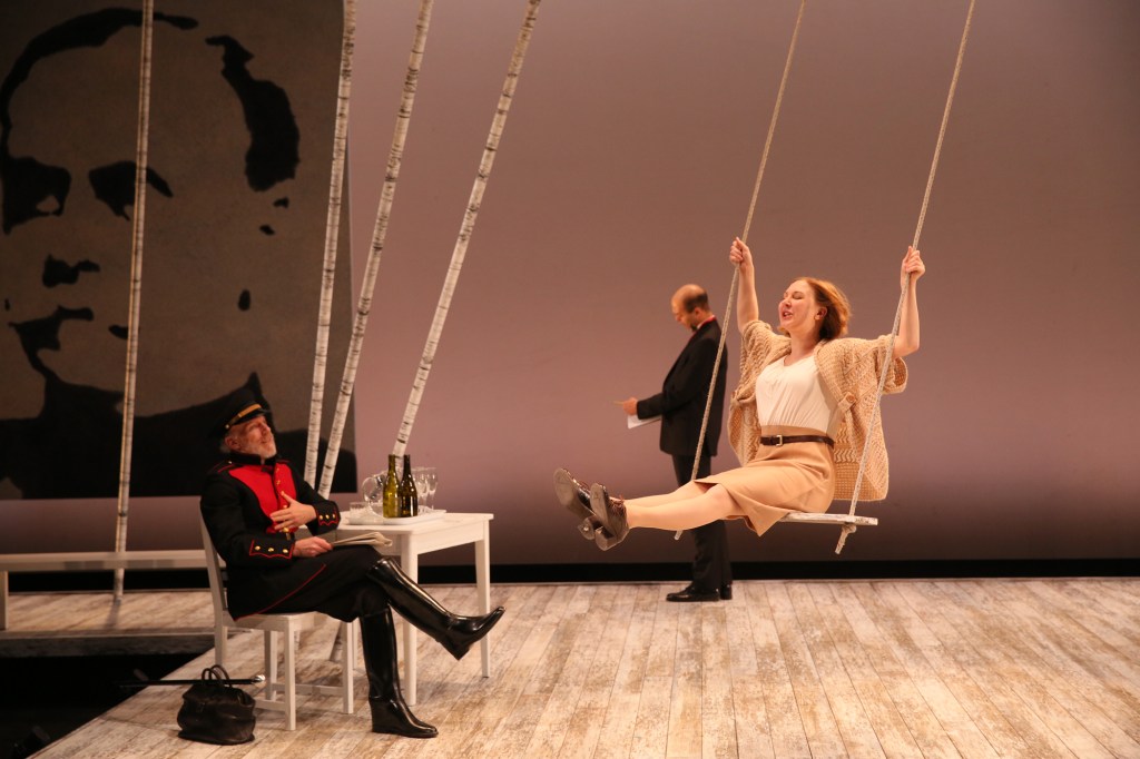 Irina (Andrews) swings while Chebutykin (Peter Crook) observes.Chris Bennion
