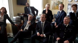 Rory Kinnear (center) as the aghast PM receiving his ransom demand in “The National Anthem.”