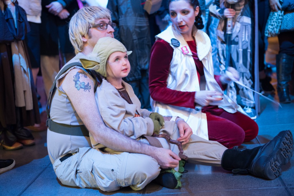 This little Yoda, complete with wooden staff, was excited to see all the costumes.