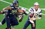 New England Patriots quarterback Tom Brady throws a pass in the first quarter.