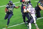 Seahawks' running back Marshawn Lynch rumbles upfield for a gain.