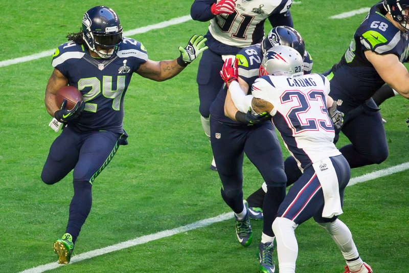 Seahawks' running back Marshawn Lynch rumbles upfield for a gain.