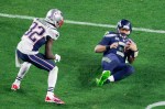 Russell Wilson slides in for a gain.
