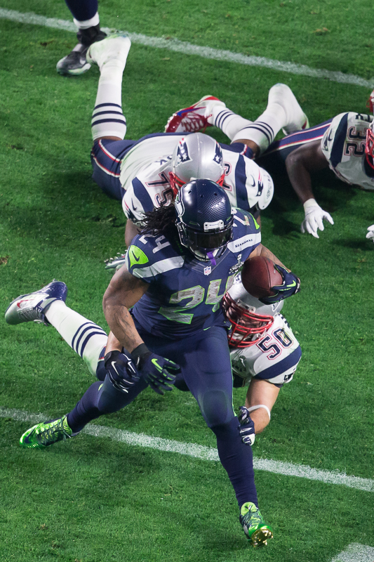 Marshawn Lynch bursts downfield for some of his 102 yards on the day.