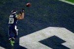 Seahawk receiver Doug Baldwin reaches for the footabll to complete a touchdown in the first half.