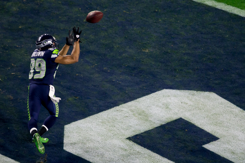Seahawk receiver Doug Baldwin reaches for the footabll to complete a touchdown in the first half.