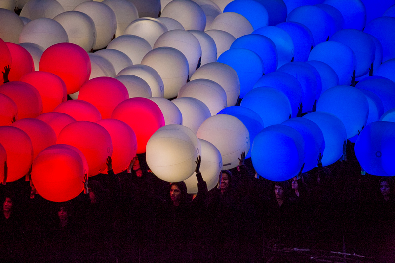 Red, white, and blue balloons light up the field during the halftime show.