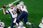 Tom Brady launches a pass in the second half.