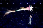 Katy Perry improbably flies over the crowd during the halftime show.