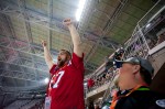 A Patriot fan cheer for the team after they win on a last-minute interception.