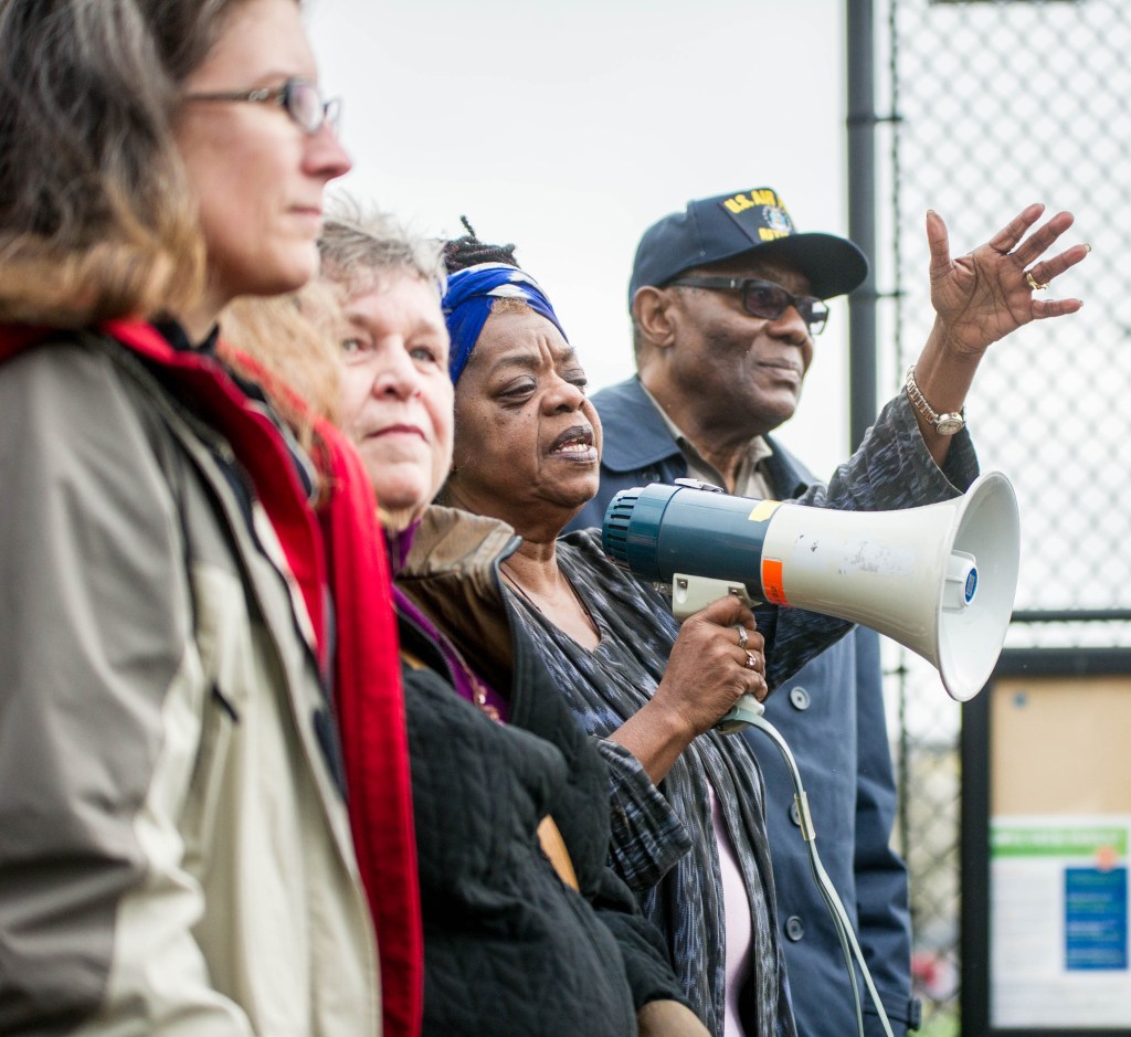 Dr. Dawn Mason, former Washington State Representative for the 37th District, describes to protesters the effects of racial profiling by Seattle police officers at the Walking While Black protest on Capitol Hill, Saturday, Feb. 7, 2015. Mason was joined by William Wingate (right), who was arrested for using a golf club as a cane on July 9, 2014.
