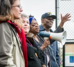 Dr. Dawn Mason, former Washington State Representative for the 37th District, describes to protesters the effects of racial profiling by Seattle police officers at the Walking While Black protest on Capitol Hill, Saturday, Feb. 7, 2015. Mason was joined by William Wingate (right), who was arrested for using a golf club as a cane on July 9, 2014.
