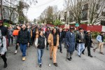 Hundreds of protesters join William Wingate on Saturday, Feb. 7, protesting racial profiling by Seattle police. Many brought golf clubs to show solidarity with  Wingate, 70, who was arrested on July 9, 2014 for using a golf club as a cane.