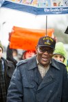 William Wingate marches with protesters during the Walking While Black protest in Seattle on Saturday afternoon. Wingate, 70, a military veteran and retired bus driver, was arrested for using a golf club as a cane on July 9, 2014.