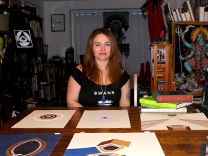 Pothast in her Central District home, which also houses her enormous library of esoteric art books. Photo by Kelton Sears.