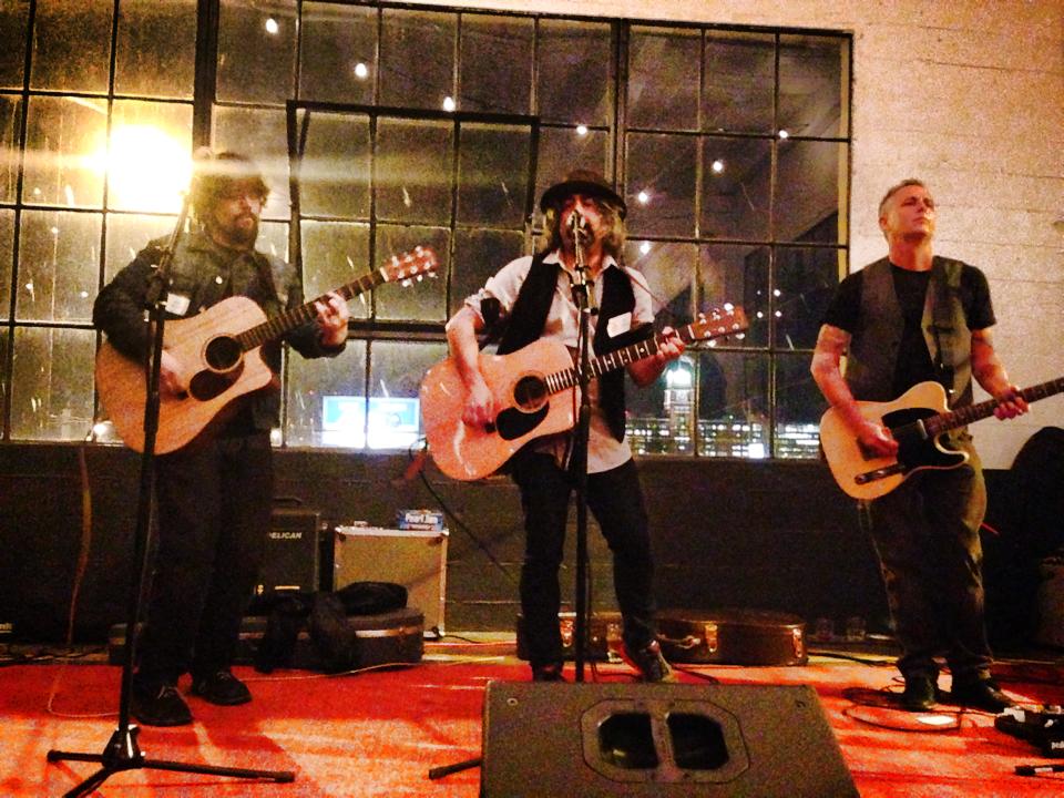 McCready (right), performing with Robb Benson (left) and Tim Dijulio.