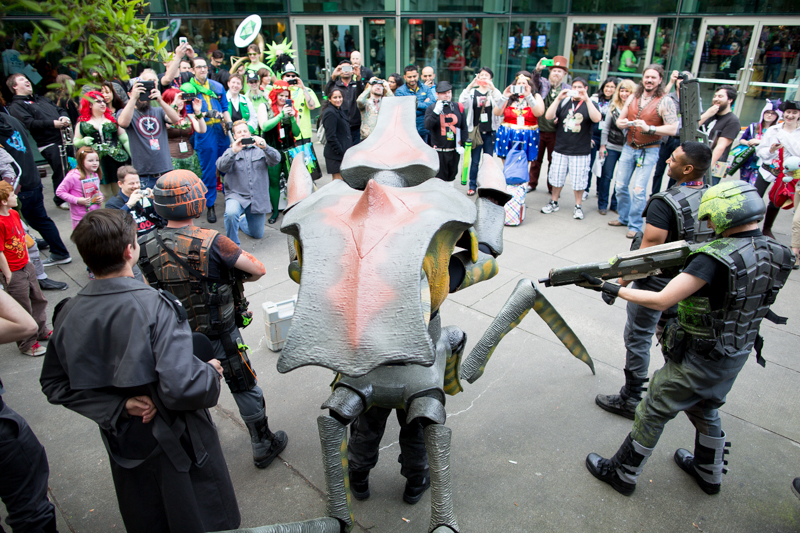  Cosplayers take a break from the grind of festivities on Saturday afternoon..