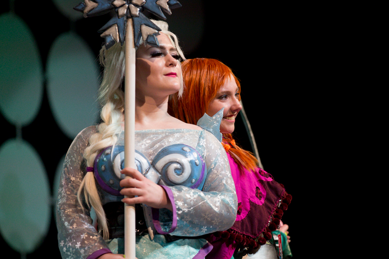  Cosplayers take a break from the grind of festivities on Saturday afternoon..