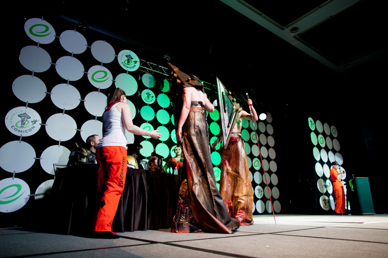  Cosplayers take a break from the grind of festivities on Saturday afternoon..