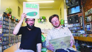 Owner Jason Grimes and store clerk Danny Noonan, keeping it weird.