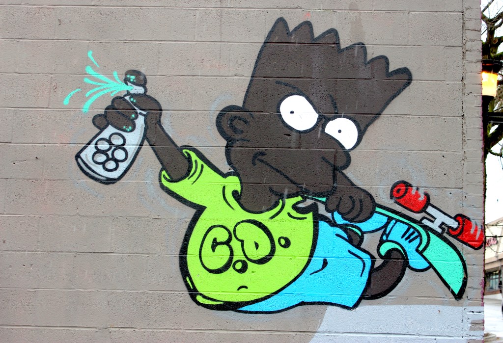 Eat my shorts, gentrification! Black Bart reps the Central District on 25th and Jackson, one of the many public neighborhood reminders (above) of the neighborhood's cultural heritage.