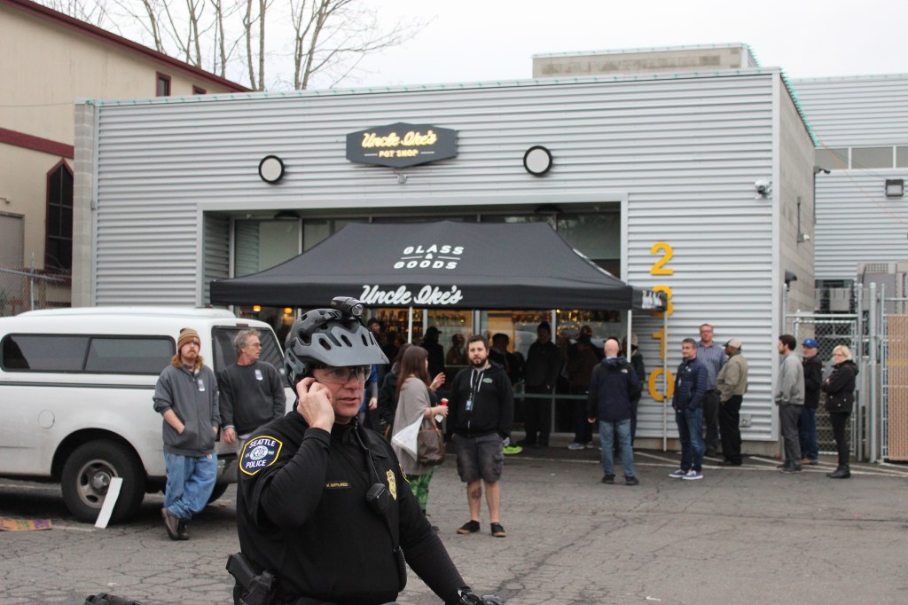 Lt. Marc Garth-Green stands outside Uncle Ike's after protesters have left. Photo by Casey Jaywork.