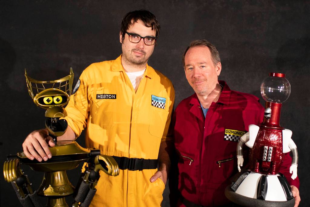 Jonah Ray (yellow) joins Crow, Servo, and original host Joel Hodgson on the Mystery Science Theater 3000 live tour. Photo courtesy MST3K