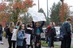 Skyline High School students and community protest perpetuation of rape culture following ISD lawsuit. Left: Chloe Strandwold, senior and organizer of protest; center: Amelia Danyuk, senior, holds sign saying Dont Tell Me How to Dress! Tell Them Not to Rape. Photo by Madison Miller