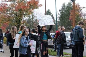 Skyline High School students and community protest perpetuation of rape culture following ISD lawsuit. Left: Chloe Strandwold, senior and organizer of protest; center: Amelia Danyuk, senior, holds sign saying Dont Tell Me How to Dress! Tell Them Not to Rape. Photo by Madison Miller