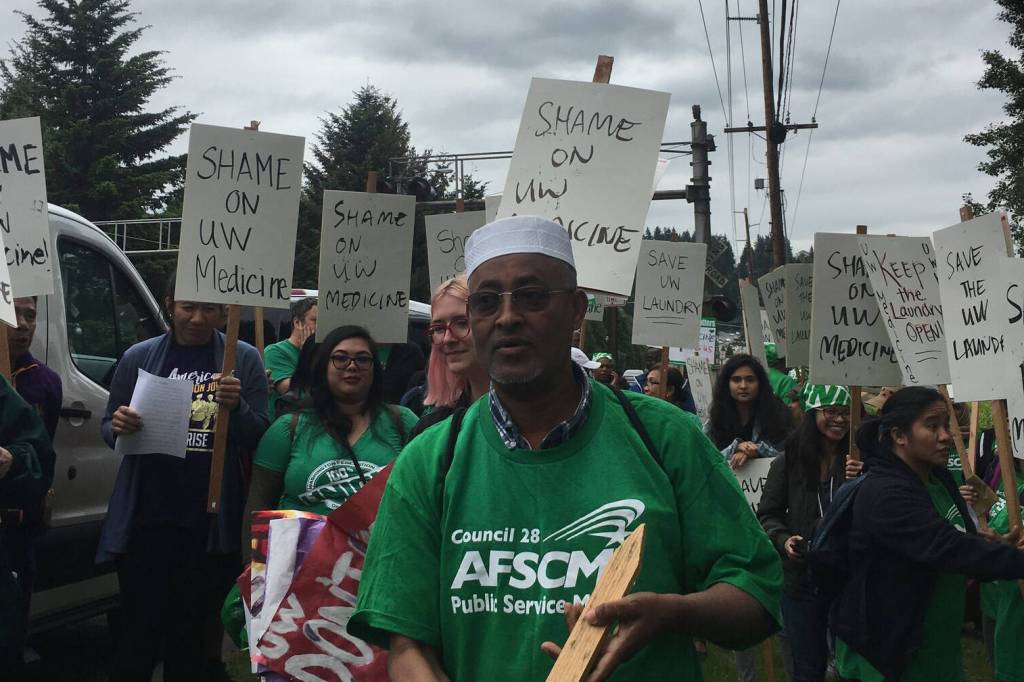 Mustafa Getahun and other Washington Federation of State Employees laundry workers picket University of Washington Medicine at Chateau Ste. Michelle Winery on May 17, 2018. Photo courtesy of the Washington Federation of State Employees