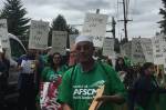 Mustafa Getahun and other Washington Federation of State Employees laundry workers picket University of Washington Medicine at Chateau Ste. Michelle Winery on May 17, 2018. Photo courtesy of the Washington Federation of State Employees