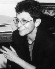 Laura Kaminsky takes a seat.